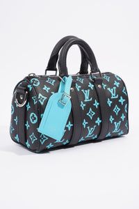 LOUIS VUITTON KEEPALL BANDOULIERE BLACK AND BLUE MONOGRAM COATED CANVAS 25CM